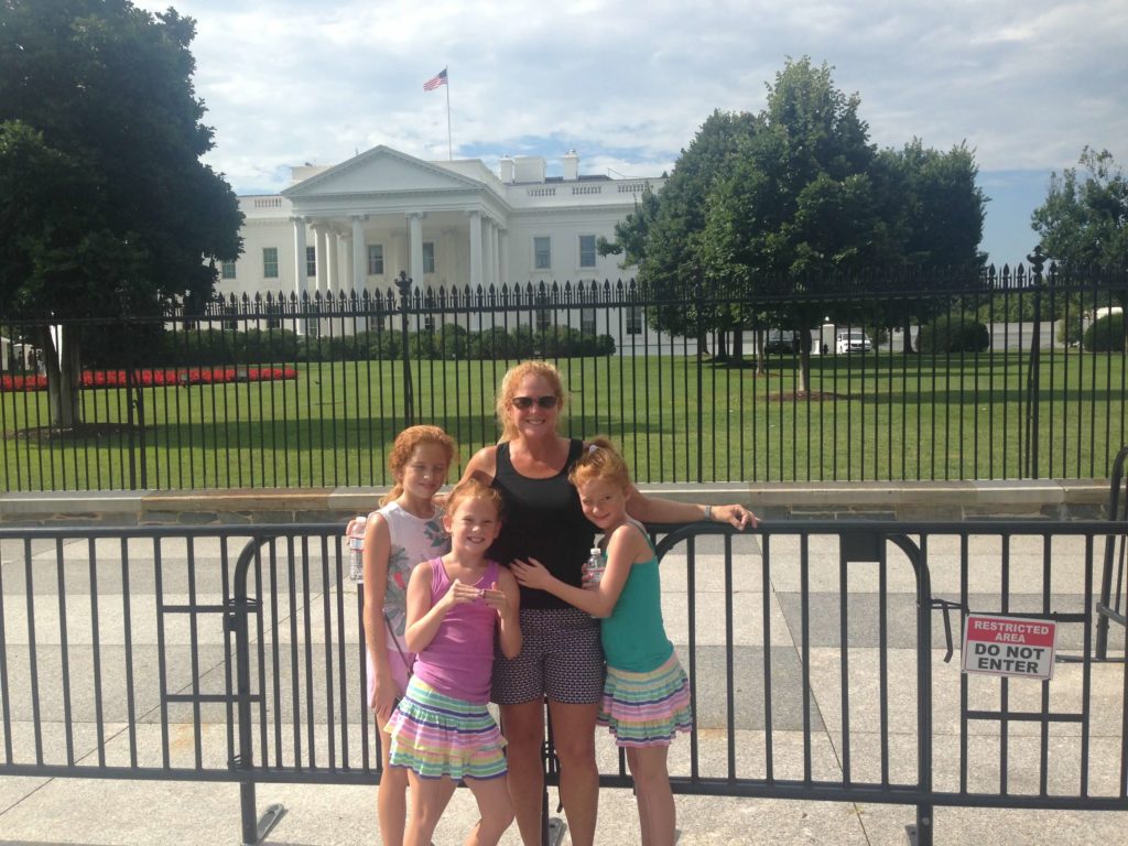 family travel photo outside of the White House in Washington D.C. 