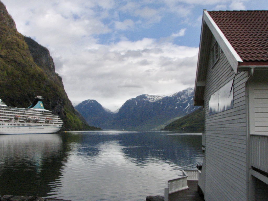 beautiful fjords in flam norway snow covered mountain and lake with cruise ship 