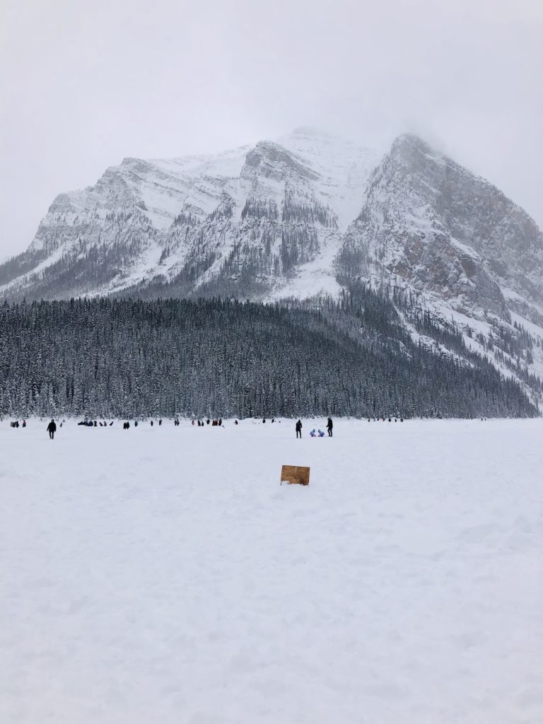 snow mountain and people in snow in Kananaskis Mountain Canadian Rockies